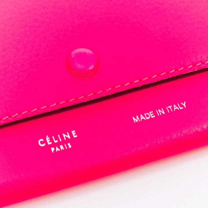 CELINE hot pink grained leather silver logo 4 fold flap wallet