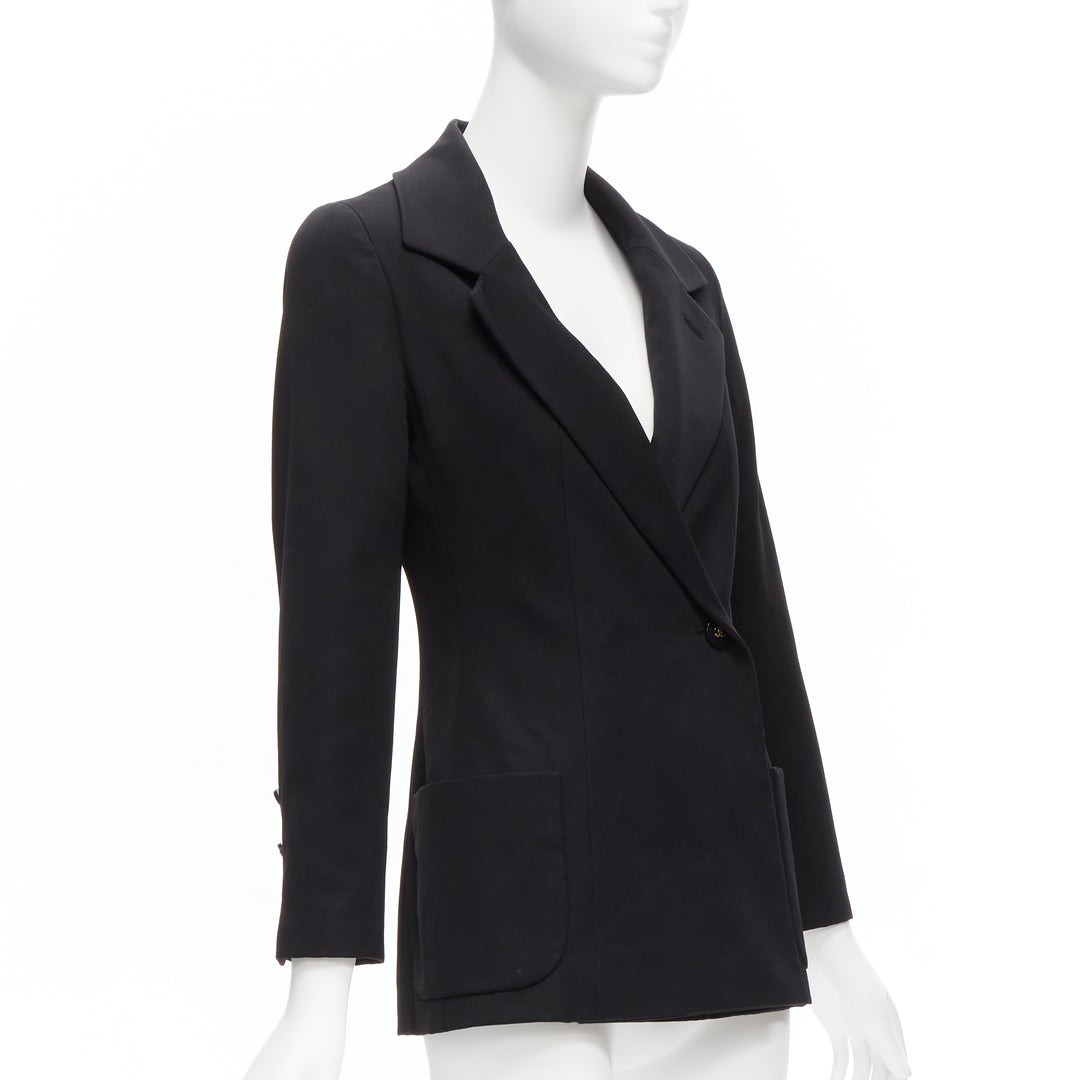 Female mannequin wearing Chanel by Karl Lagerfeld Fall 1994 Black Wool Women Blazers in Size FR34 | Available at JHROP