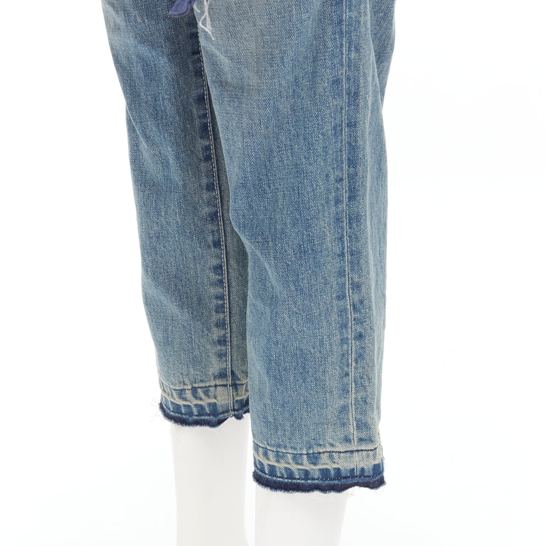 Female mannequin wearing Sacai by Chitose Abe Blue Denim Women Pants in Size  S | Available at JHROP