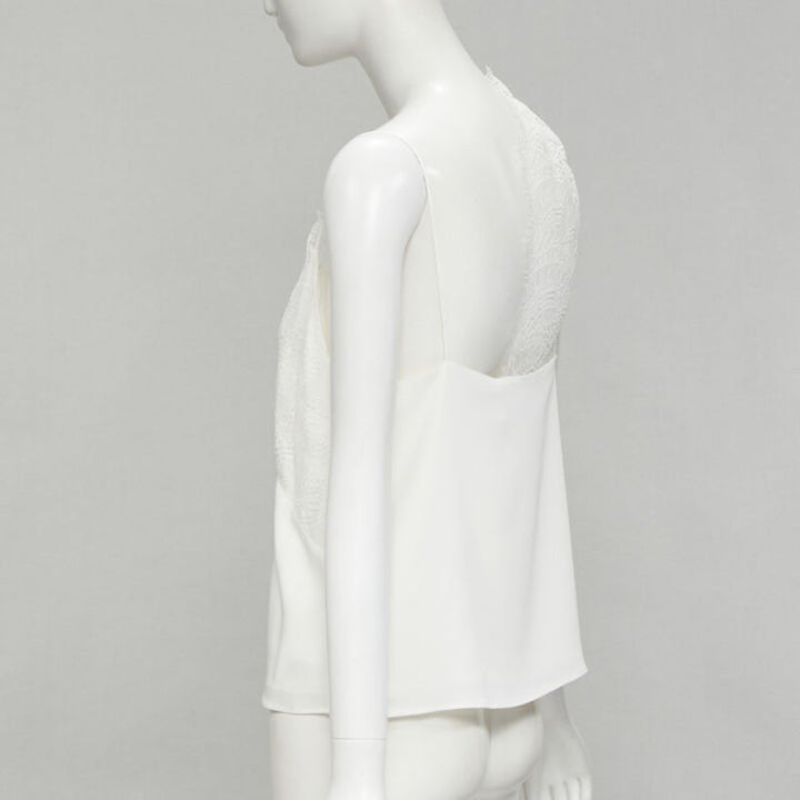 Female mannequin wearing Christopher Esber White Viscose Women Camisole in Size UK10 | Available at JHROP