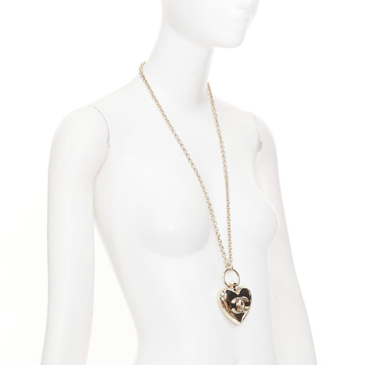 CHANEL B22C AB7531 Giant Heart Locket gold plated CC locket long chain necklace