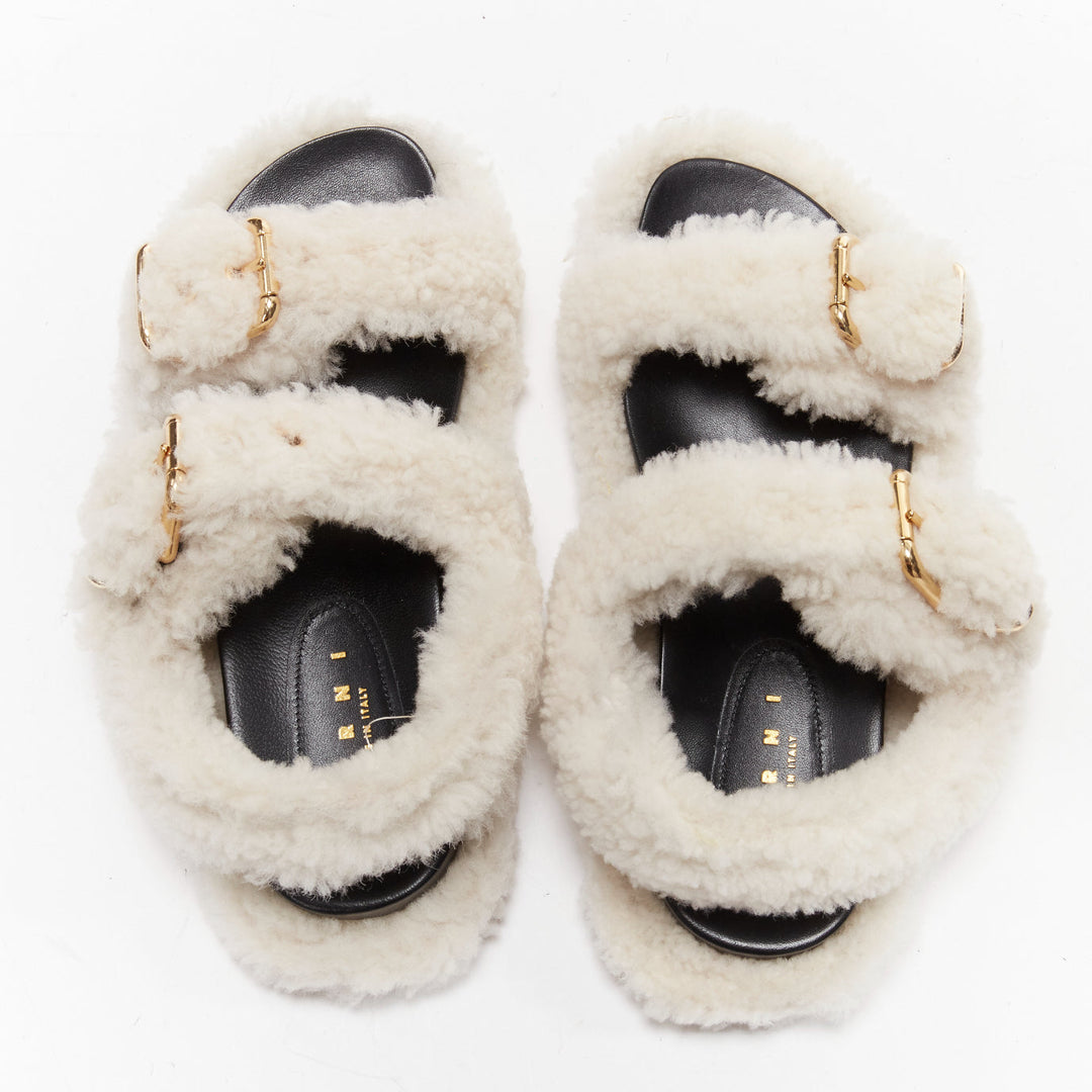MARNI white shearling gold buckles double strap black lined flat sandals EU38