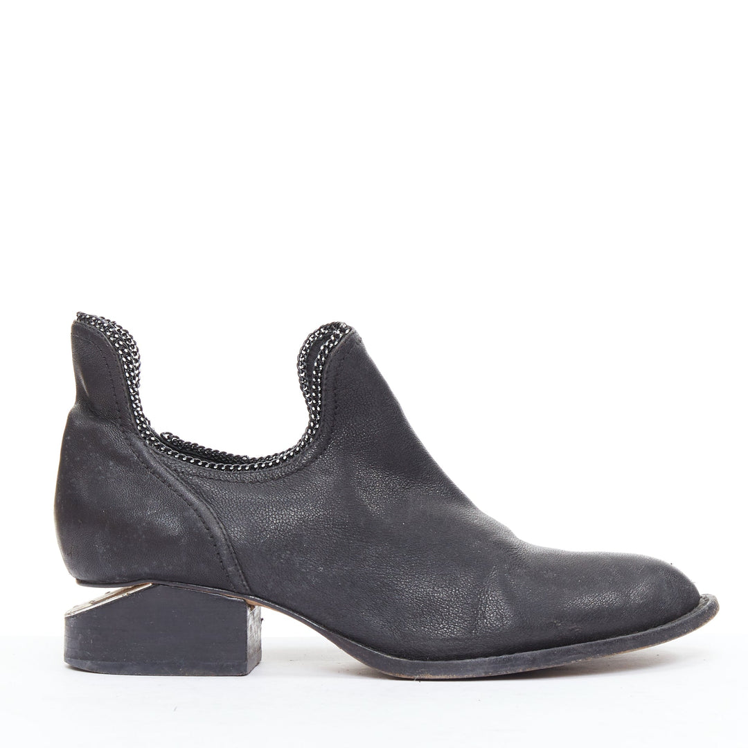 Female mannequin wearing Alexander Wang Black Leather Women Flats in Size EU38 | Available at JHROP