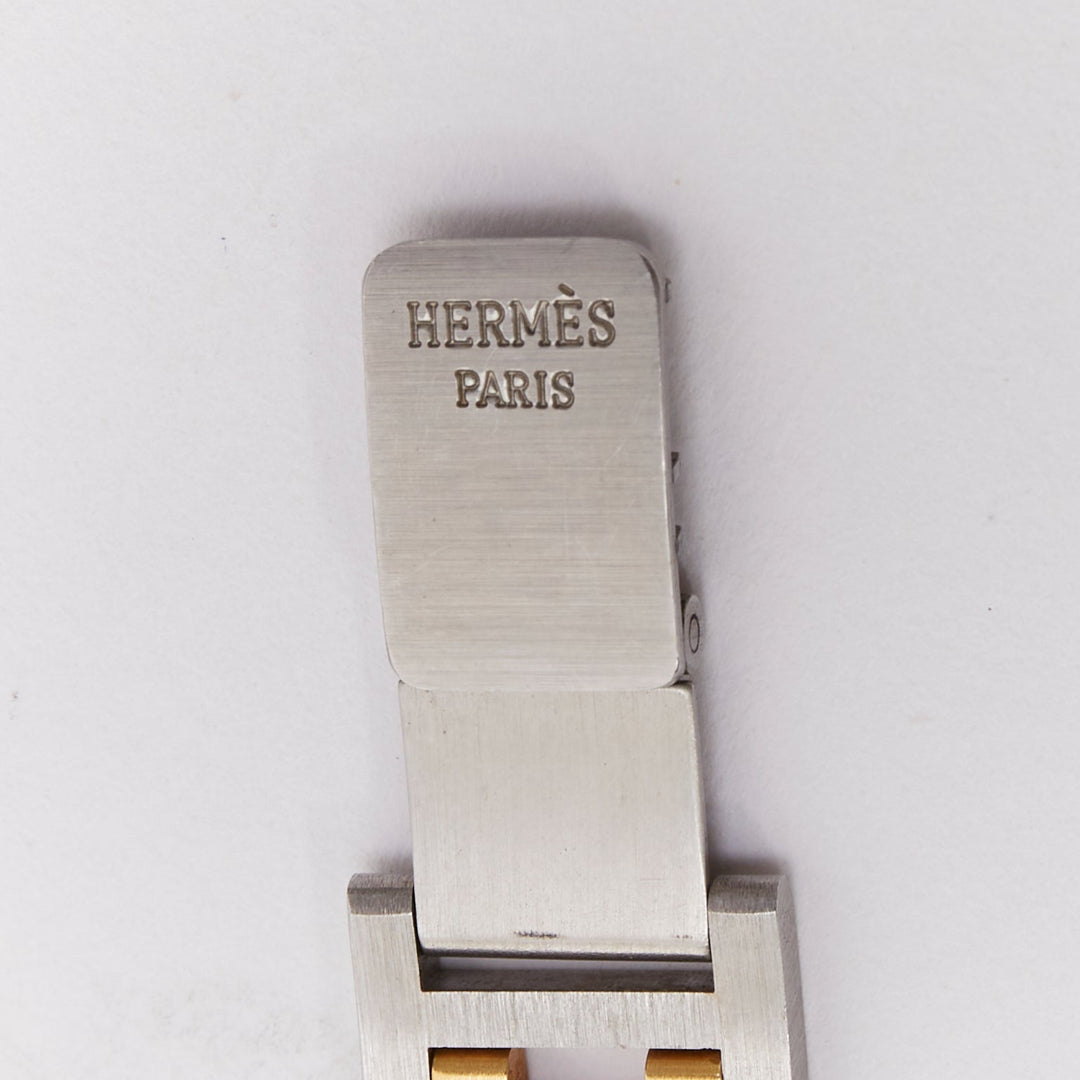 HERMES Rallye two-tone stainless steel gold plated saddle oval quartz watch