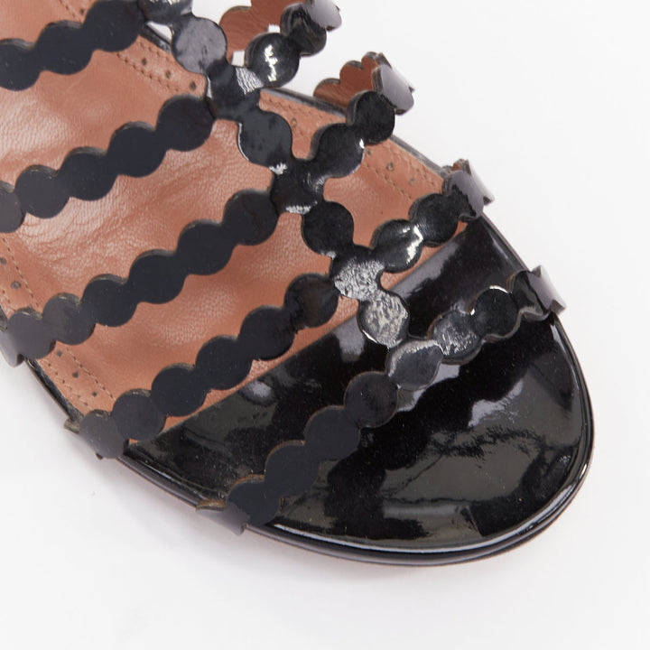 ALAIA black patent leather laser cut scalloped cage gladiator flat sandals EU36