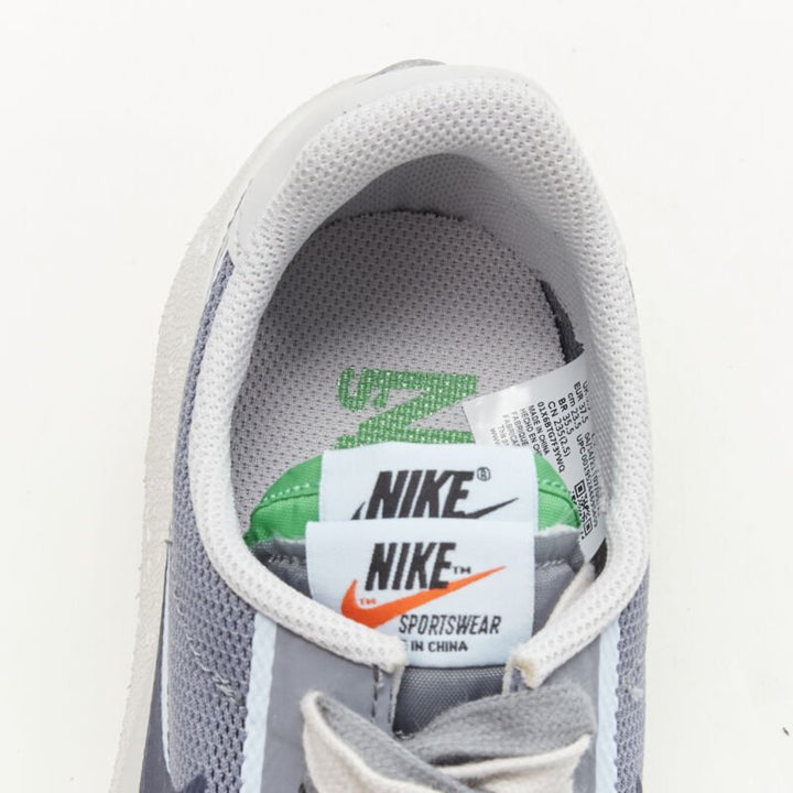 Female mannequin wearing Nike by Chitose Abe Clot Collaboration Grey Fabric Women Sneakers in Size US5 | Available at JHROP