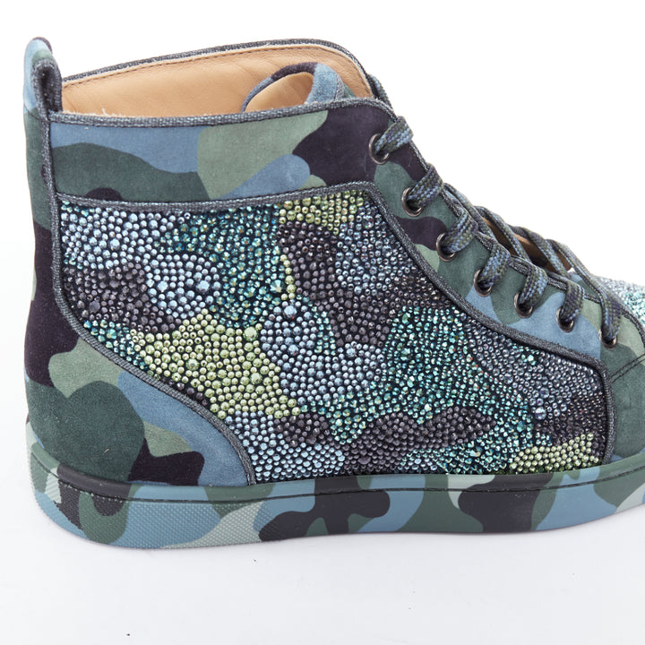 Male mannequin wearing Christian Louboutin Louis Orlato Strass Blue Suede Men Sneaker in Size EU42 | Available at JHROP