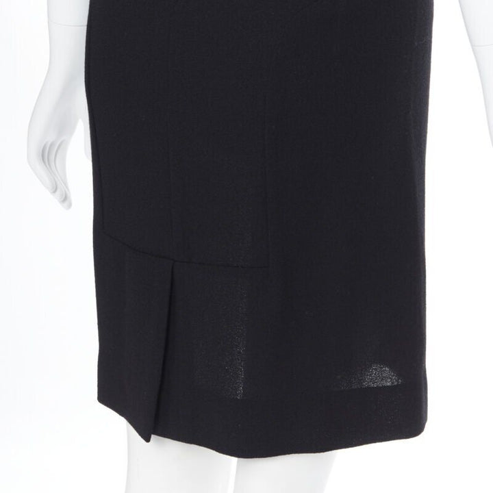 Female mannequin wearing Yves Saint Laurent by Stefano Pilati Sheath dress Black Wool Women Cocktail Dresses in Size FR36 | Available at JHROP