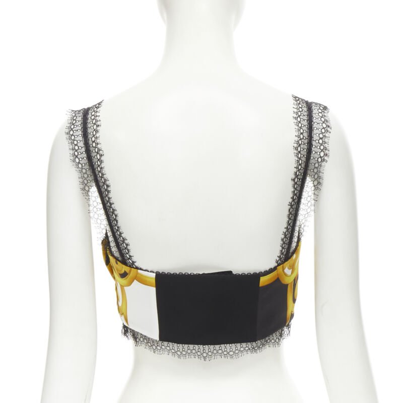 Female mannequin wearing Versace by Donatella Versace Barocco Acanthus Gold Polyester Women Bustier in Size IT38 | Available at JHROP