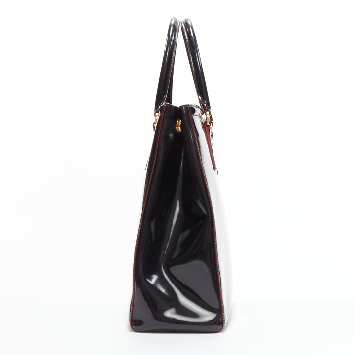 Female mannequin wearing Prada by Miuccia Prada Parabole Spazzolato Black Patent Leather Women Bag in Size  | Available at JHROP