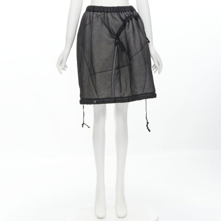 Female mannequin wearing Comme Des Garcons by Rei Kawakubo 1990 Black Nylon Women Skirt in Size  M | Available at JHROP