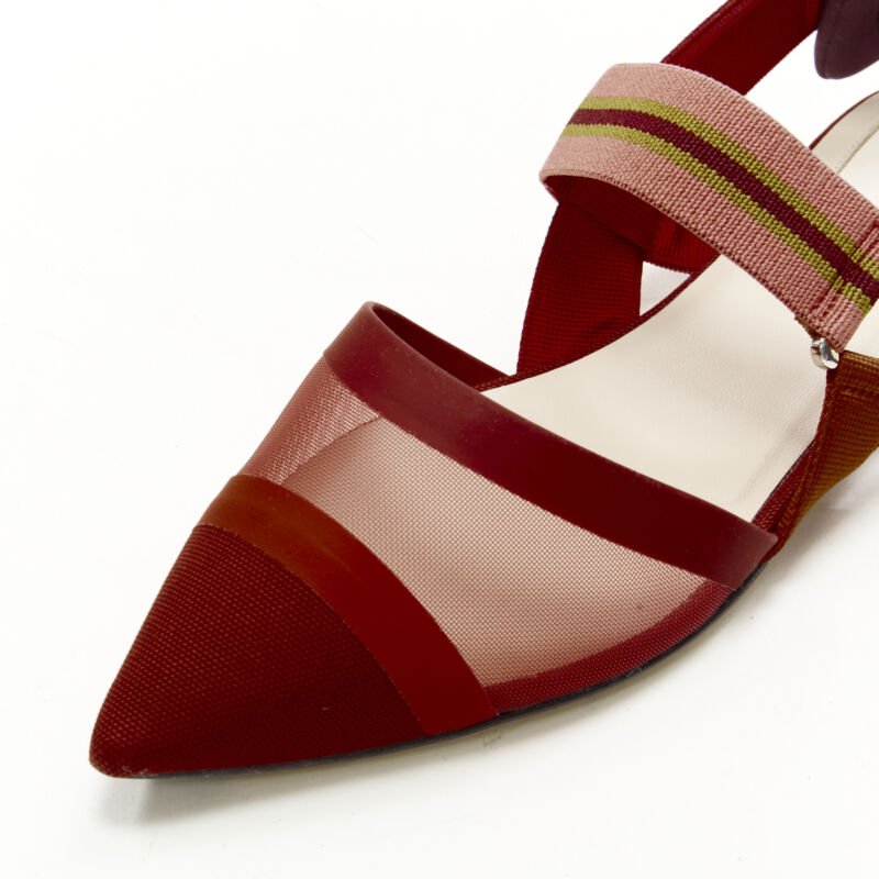 Female mannequin wearing Fendi Colibri Red Fabric Women Flats in Size EU36.5 | Available at JHROP