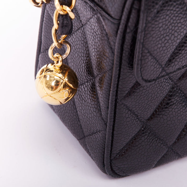 CHANEL 1990 Vintage black caviar quilted leather CC turnlock mini camera bag