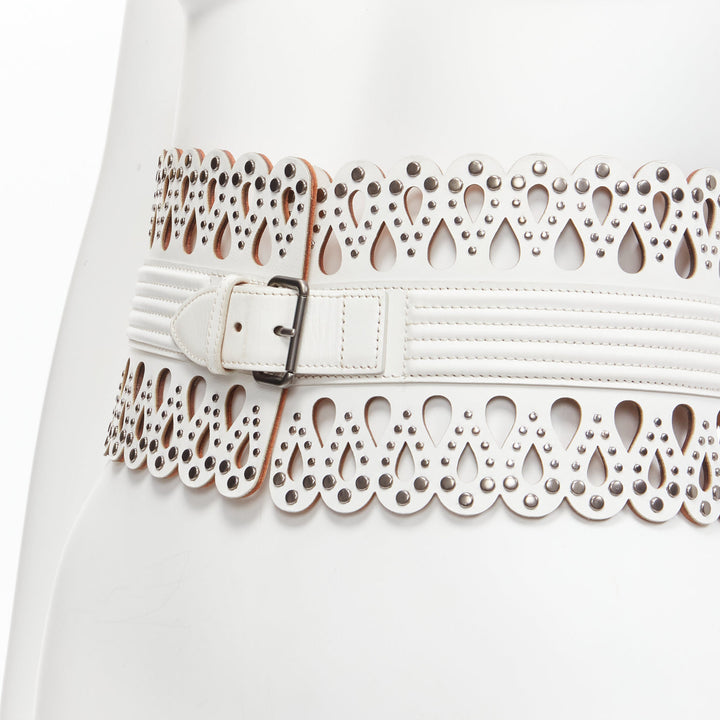 AZZEDINE ALAIA white laser cut studded leather corset waist belt 70cm