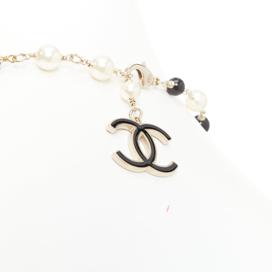 CHANEL 10C Runway CC Logo Faux Pearl Sautoir coco figurine charm necklace