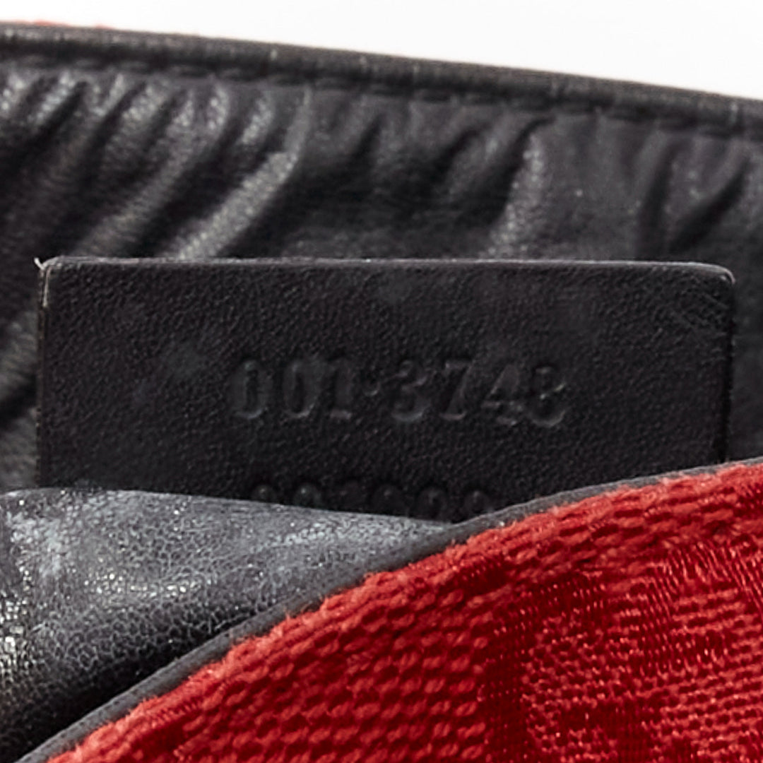 GUCCI Vintage red GG monogram canvas black leather drawstring bag