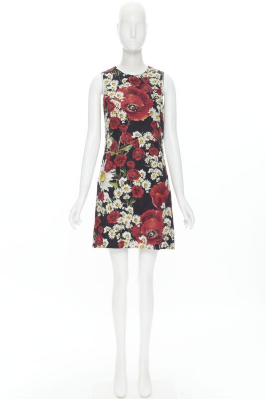 Female mannequin wearing Dolce Gabbana Poppy daisy jacquard dress Black Cotton Women Cocktail Dresses in Size IT36 | Available at JHROP