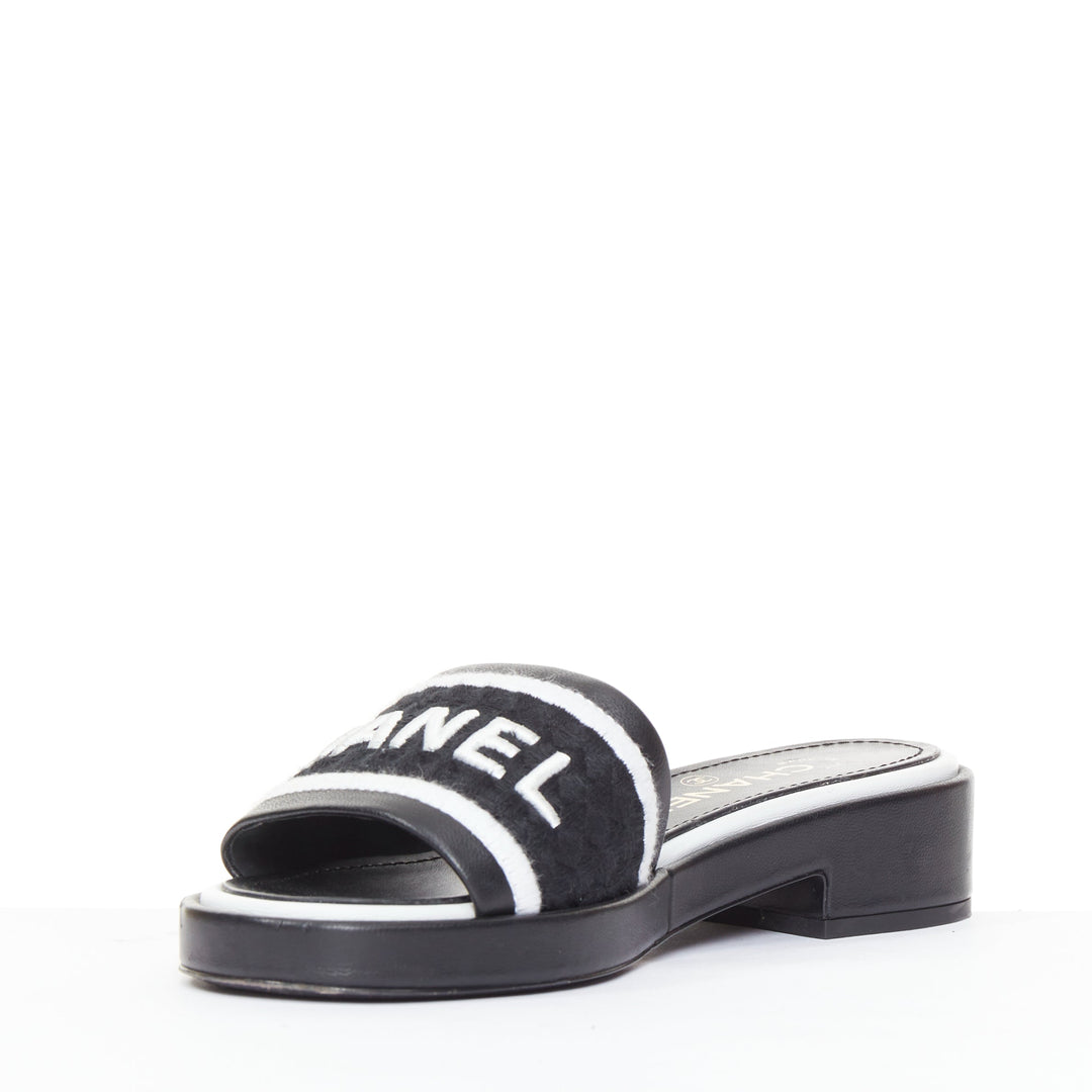 CHANEL 2021 Runway black white logo embroidered lambskin CC mule sandals EU35.5