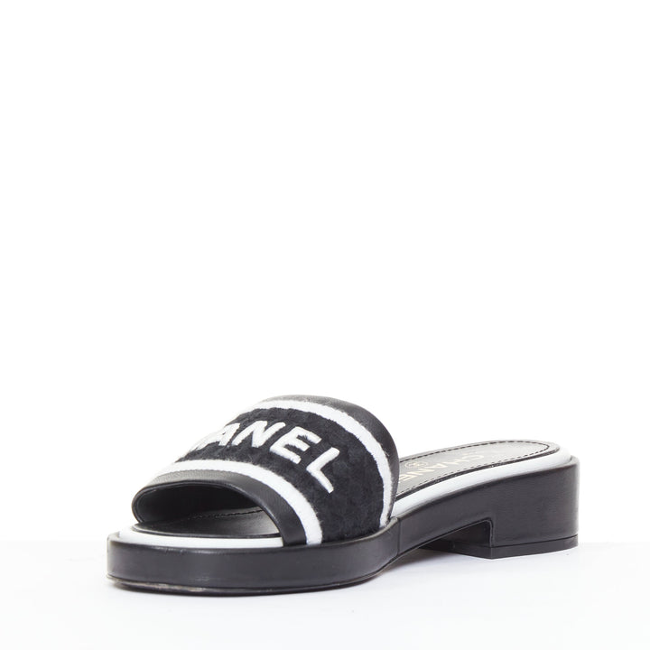 CHANEL 2021 Runway black white logo embroidered lambskin CC mule sandals EU35.5