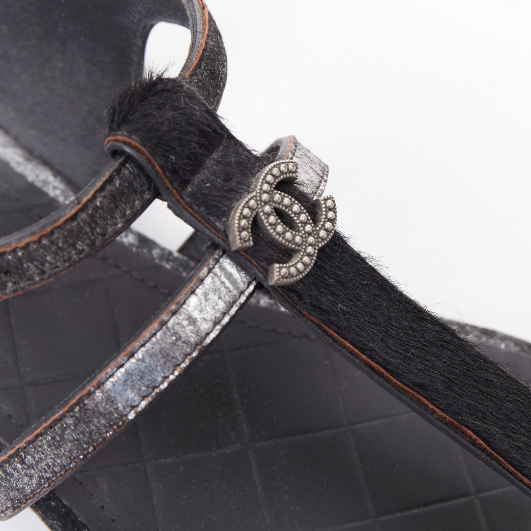 CHANEL black pony hair metallic leather CC charm T-strap thong flat sandals EU36