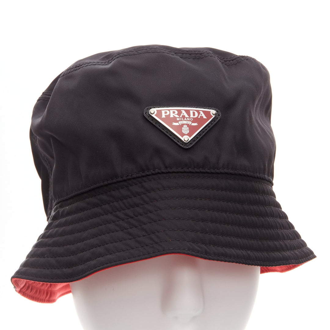 PRADA Symbole black metal triangle logo red inside nylon bucket hat M