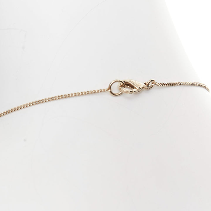 CHANEL B21S champagne gold tone CC logo clasp locket pendent necklace