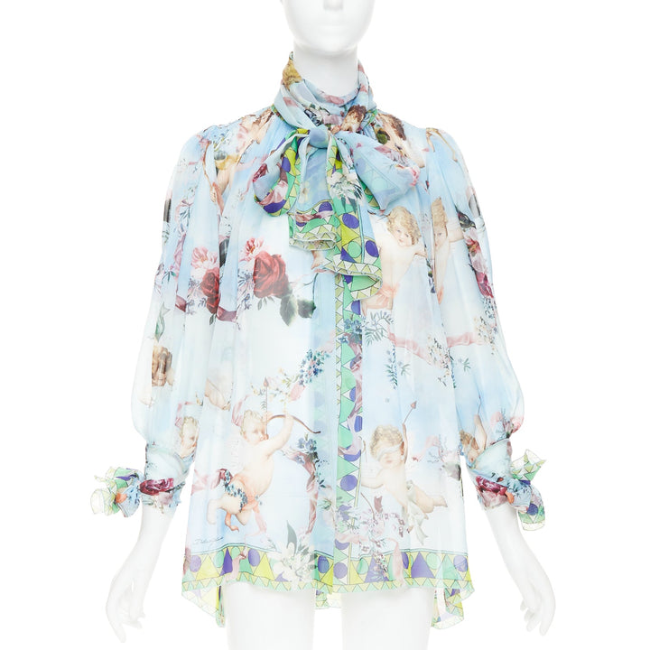 DOLCE GABBANA  100% silk blue Cherub Cupids print pussybow sheer blouse IT40 S