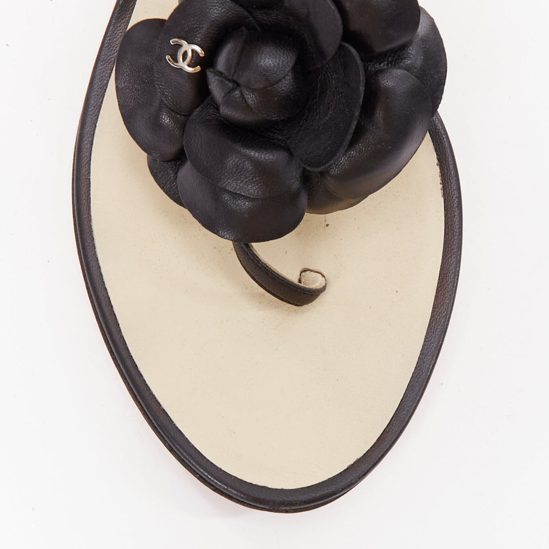 CHANEL black leather silver CC logo camellia flat T strap sandals EU37.5