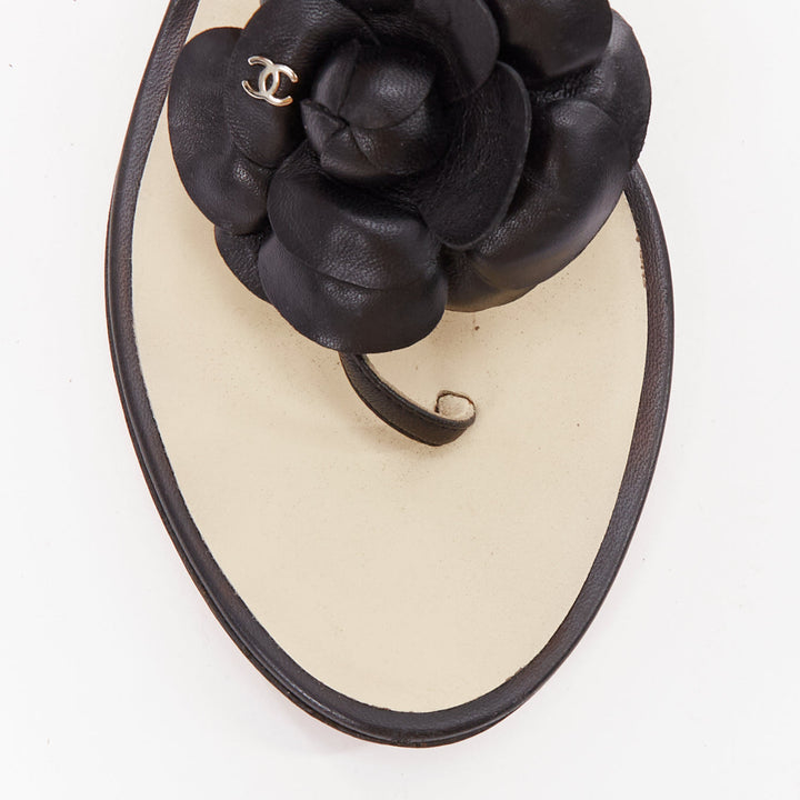 CHANEL black leather silver CC logo camellia flat T strap sandals EU37.5