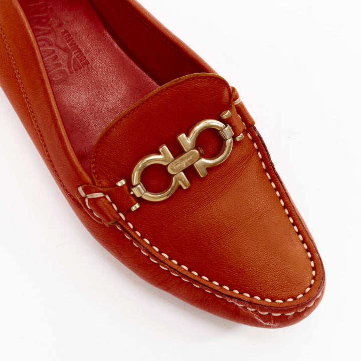 SALVATORE FERRAGAMO burnt orange leather gold logo buckle loafers 6.5