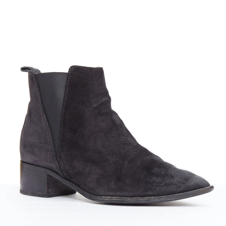 Female mannequin wearing Acne Studios Jensen Black Suede Women Boots in Size EU38 | Available at JHROP