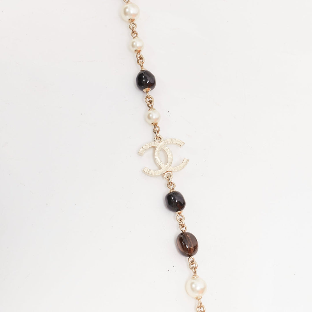 CHANEL A14C red black resin faux pearl CC logo station chain sautoir necklace