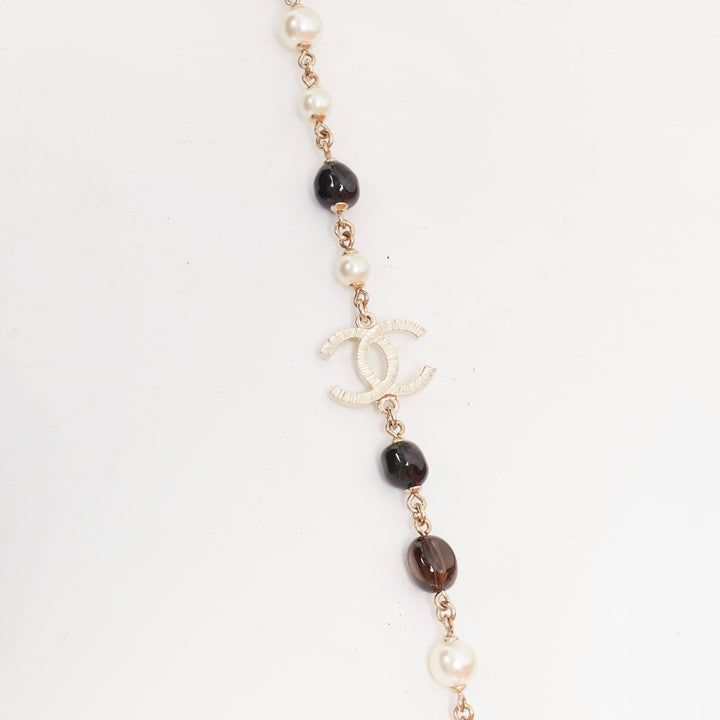 CHANEL A14C red black resin faux pearl CC logo station chain sautoir necklace