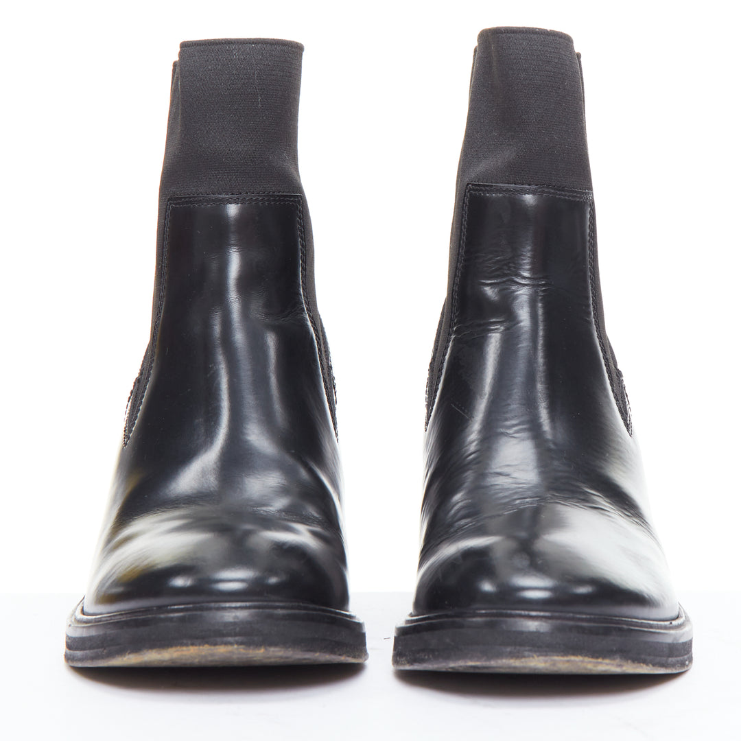 Female mannequin wearing Acne Studios Dion Black Leather Women Boots in Size EU38 | Available at JHROP