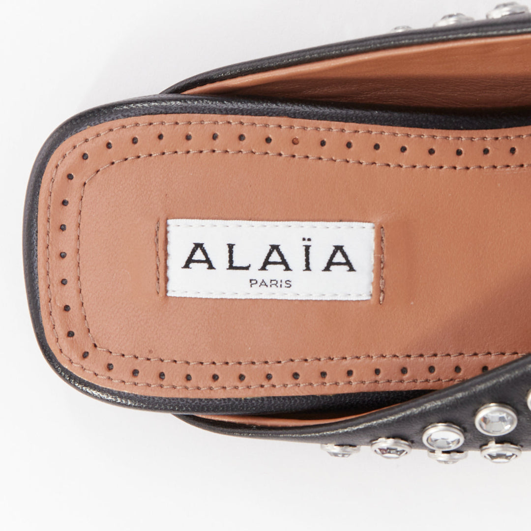 ALAIA Crystal Slide On black leather clear strass embellished flat mule EU38
