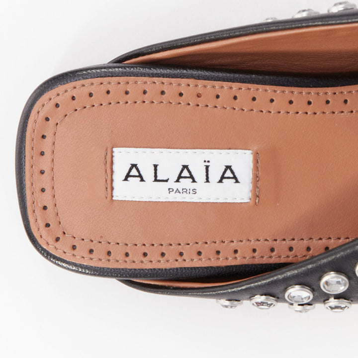 ALAIA Crystal Slide On black leather clear strass embellished flat mule EU38