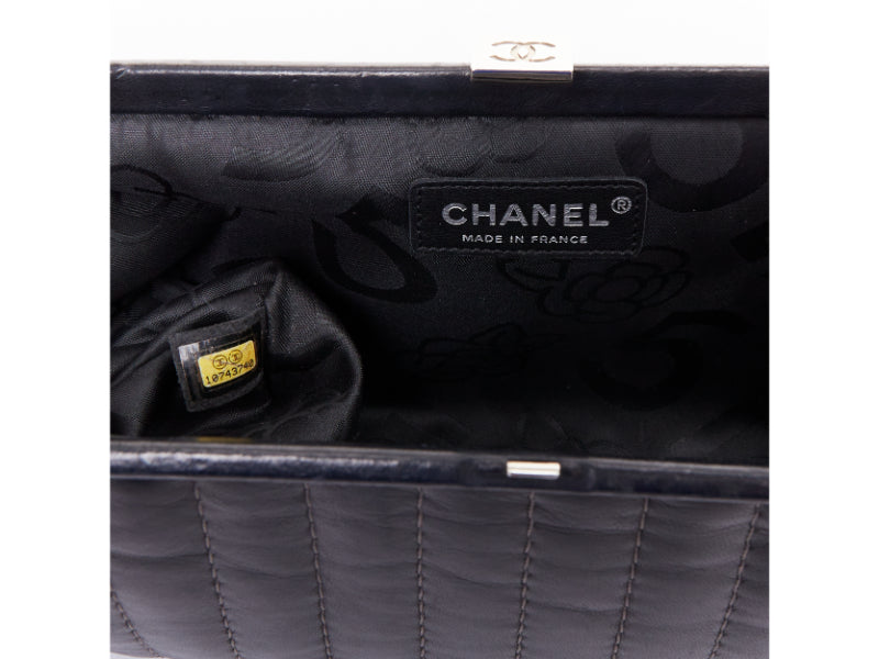 CHANEL 2005 Mademoiselle Ligne black vertical quilt lambskin kisslock clutch bag