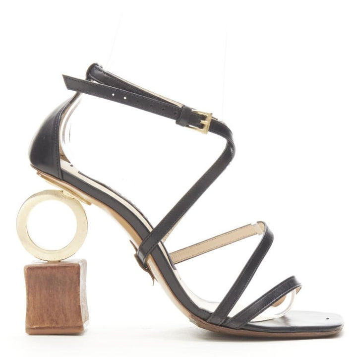 JACQUEMUS architectural wood block gold ring black strappy heel EU36