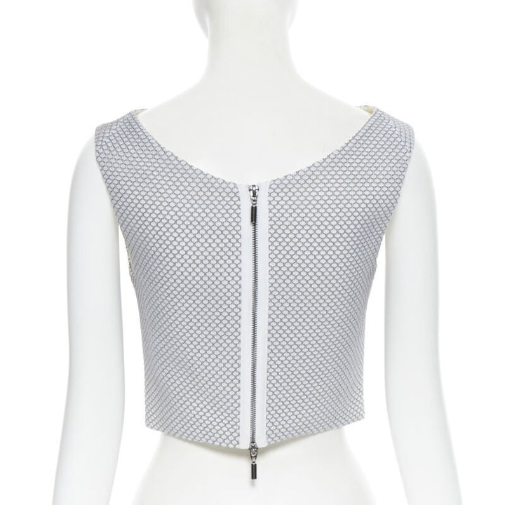 Female mannequin wearing Maticevski 2016 White Polyester Women Crop Top in Size  XS | Available at JHROP