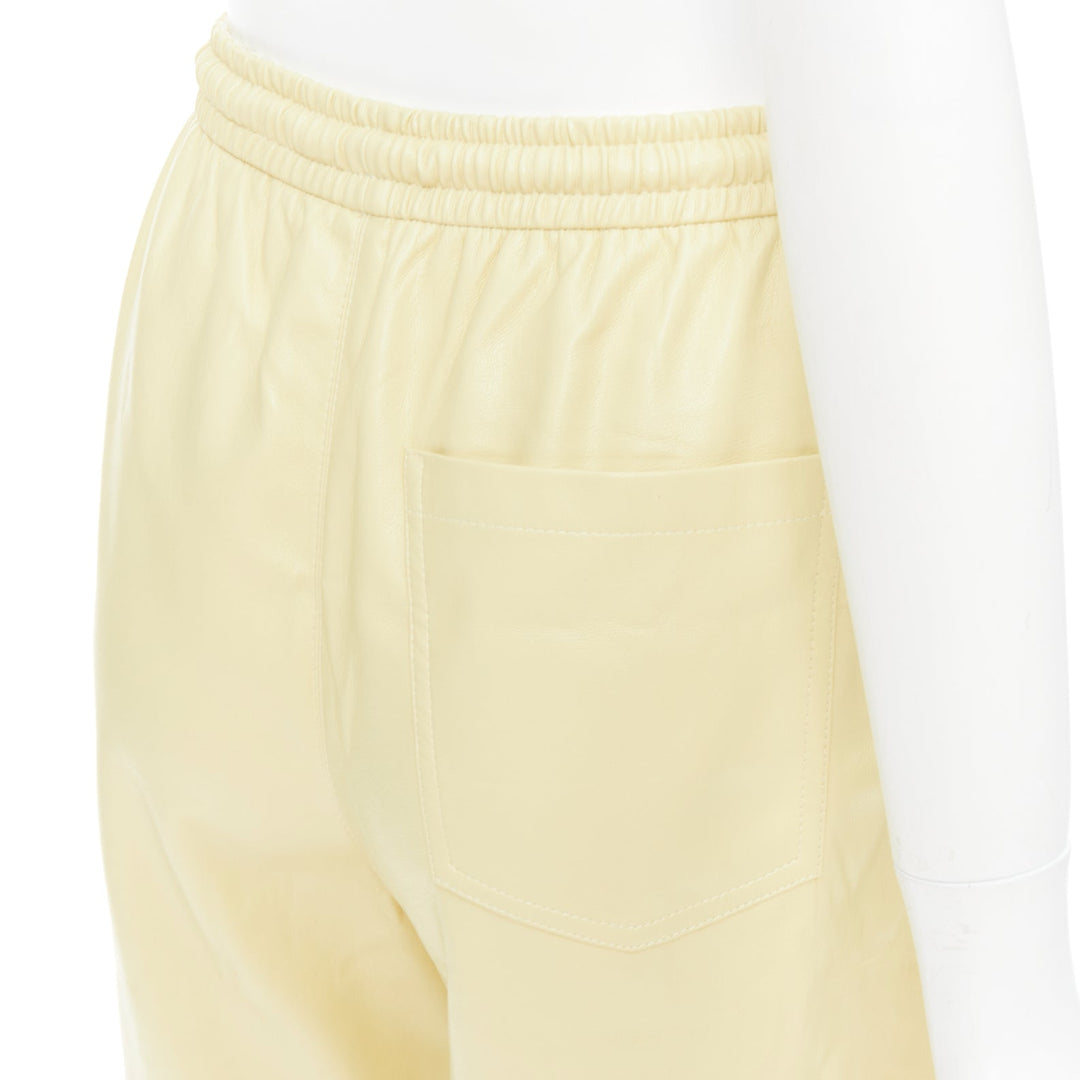 NANUSHKA  Munira Okobor butter yellow vegan leather drawstring bermuda shorts XS