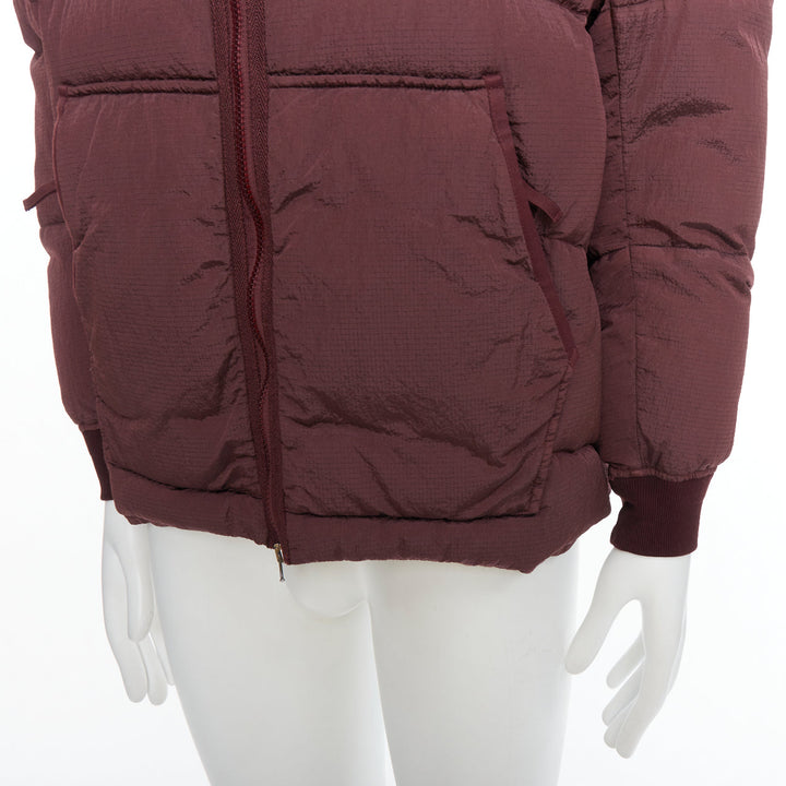 Male mannequin wearing Stone Island Purple Nylon Men Puffer Jacket in Size  M | Available at JHROP