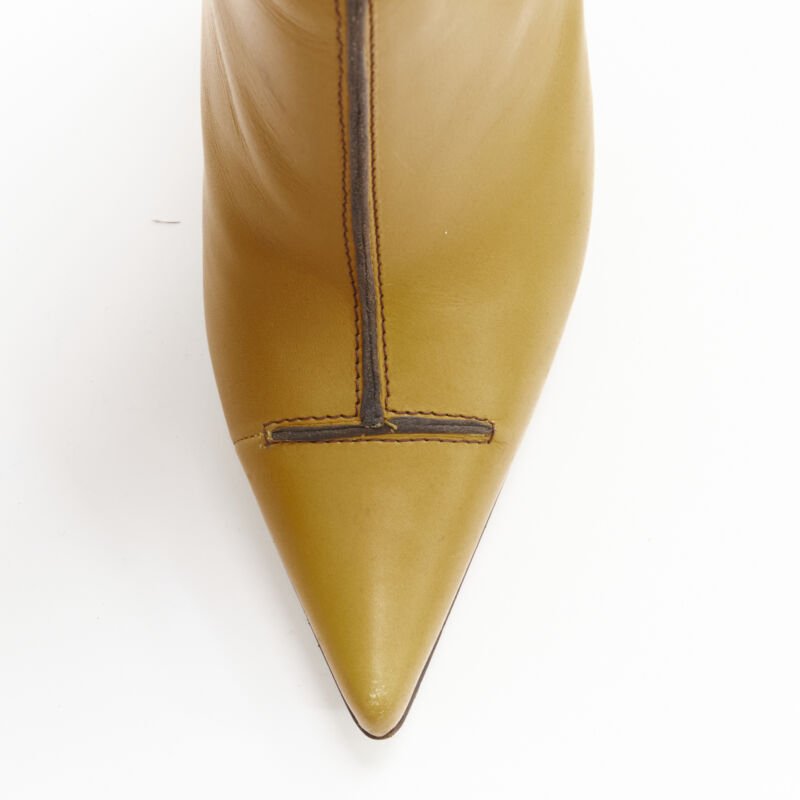 Female mannequin wearing Dsquared2 Yellow Yellow Leather Women Boots in Size EU36.5 | Available at JHROP