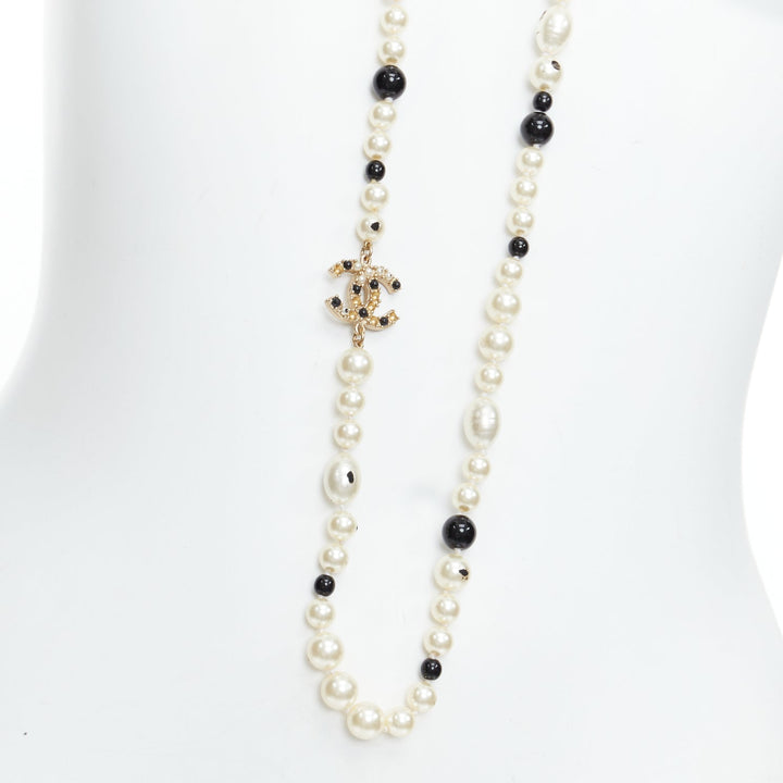 CHANEL 08P black Camelia enamel station faux pearl CC long necklace