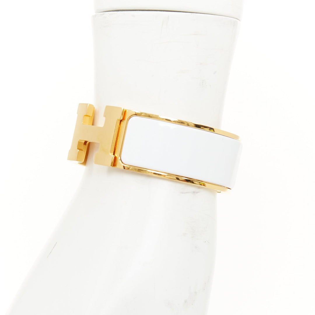 HERMES Clic H white enamel signature logo gold plated narrow cuff bracelet