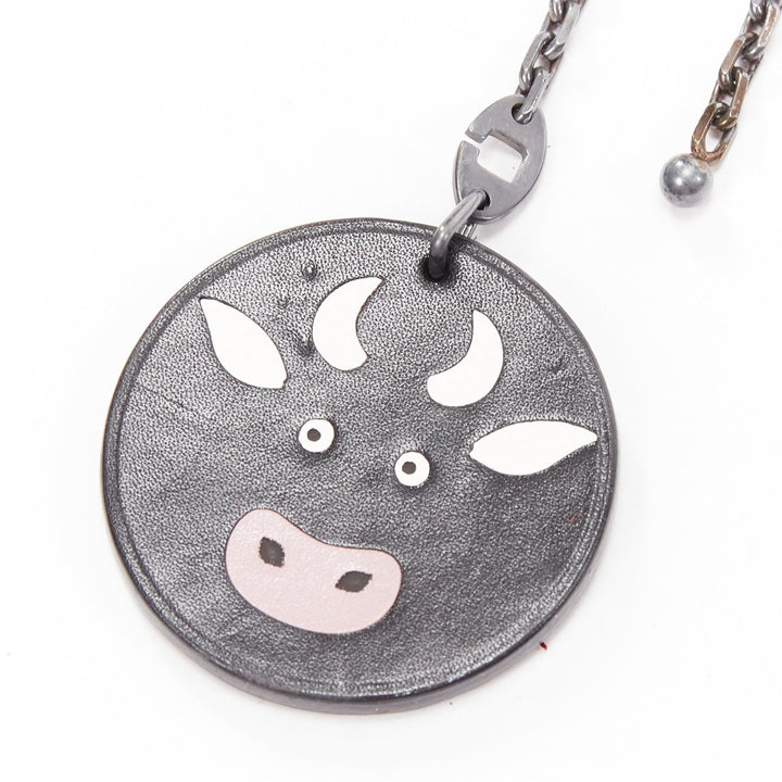 HERMES Cow Charm black leather coin ruthenium bag charm