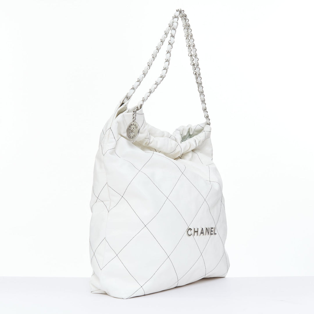 CHANEL 2022 Runway 22 Medium white quilted shiny calfskin silver hobo bag