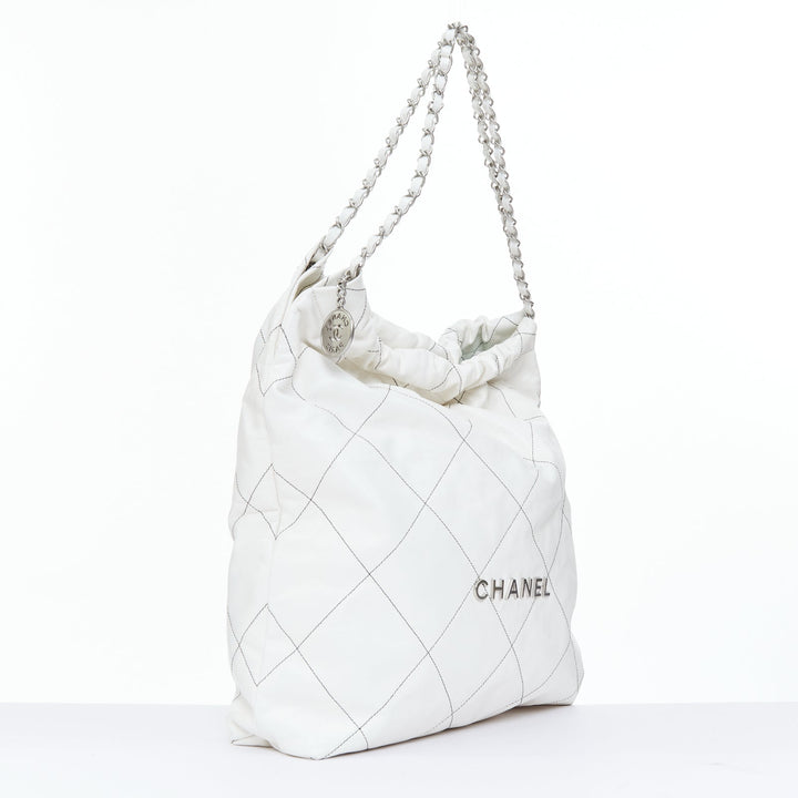 CHANEL 2022 Runway 22 Medium white quilted shiny calfskin silver hobo bag