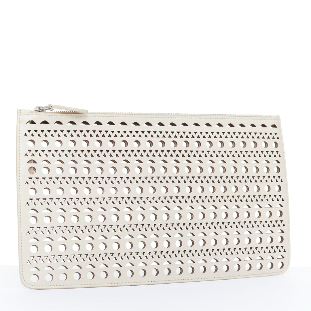 ALAIA Vienne laser cut tan beige neutral calfskin flat zip pouch clutch bag