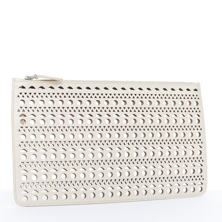 ALAIA Vienne laser cut tan beige neutral calfskin flat zip pouch clutch bag