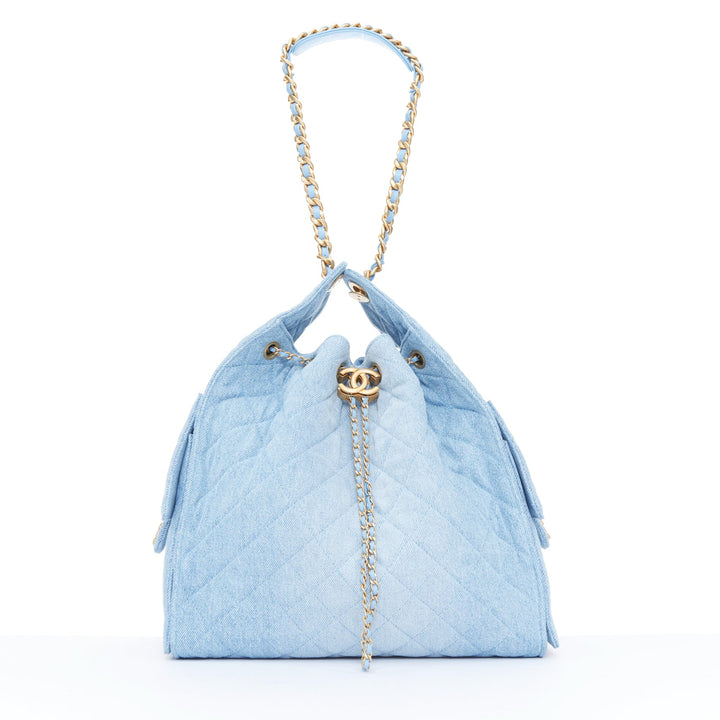 CHANEL Runway 25 Small light blue washed denim gold hardware bucket hobo bag